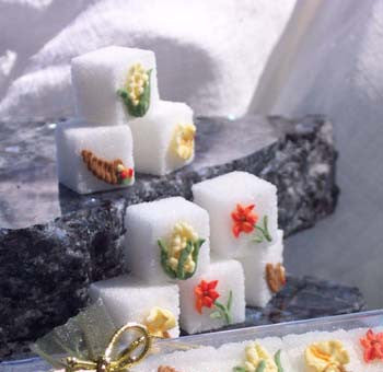 Decorated sugar cubes with corn, flowers, cornucopias